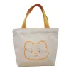 The white canvas bag and the orange bear pattern hand-held shopping bag are simple and versatile for daily commuting Item Picture